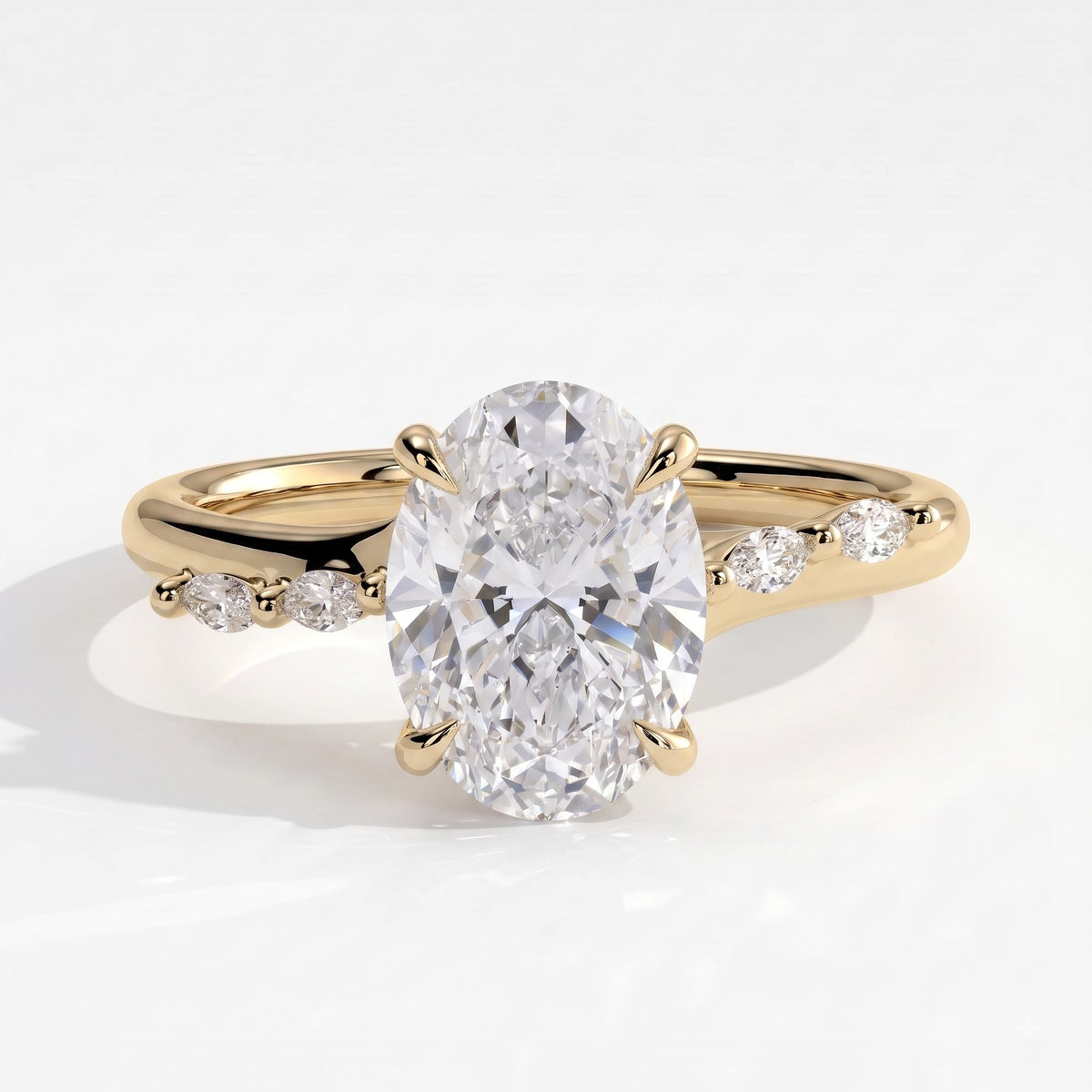 Oval lab-grown diamond halo engagement ring in 14K (585) yellow gold, front view 