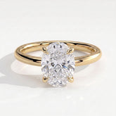 Oval lab-grown diamond solitaire engagement ring in 18K (750) yellow gold, front view 