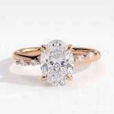 Oval lab-grown diamond halo engagement ring in 18K (750) rose gold, front view 