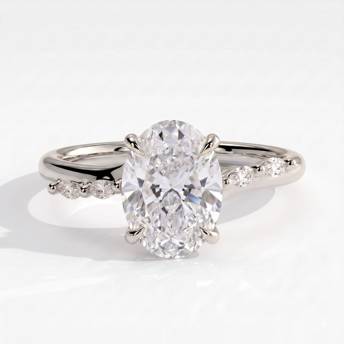 Oval lab-grown diamond halo engagement ring in 950 platinum, front view 