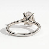 Oval lab-grown diamond solitaire engagement ring in 14K (585) white gold, on white background 