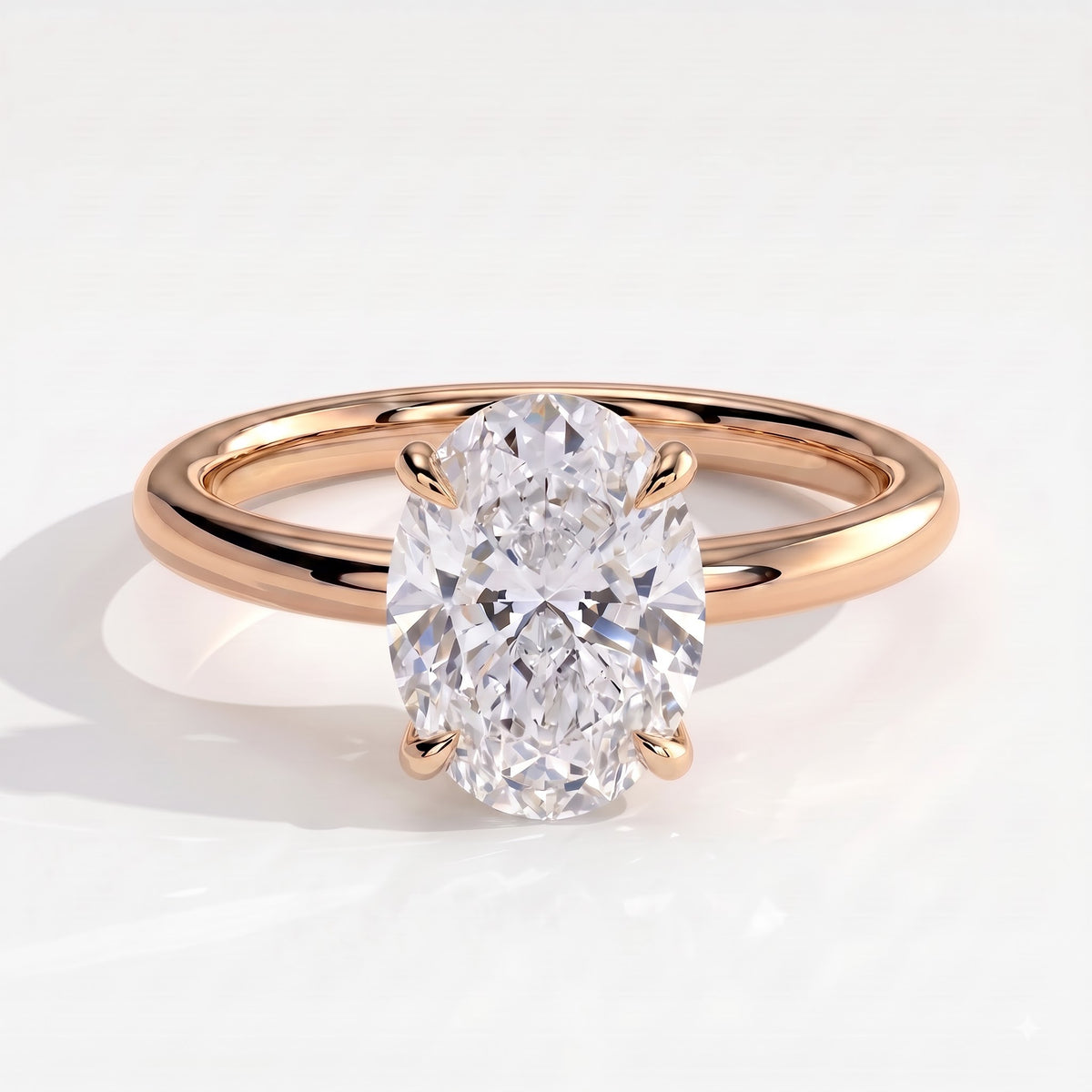 Oval lab-grown diamond solitaire engagement ring in 14K (585) rose gold, front view 