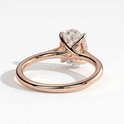 Oval lab-grown diamond solitaire engagement ring in 14K (585) rose gold, on white background 