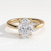 Oval lab-grown diamond solitaire engagement ring in 18K (750) yellow gold, front view 