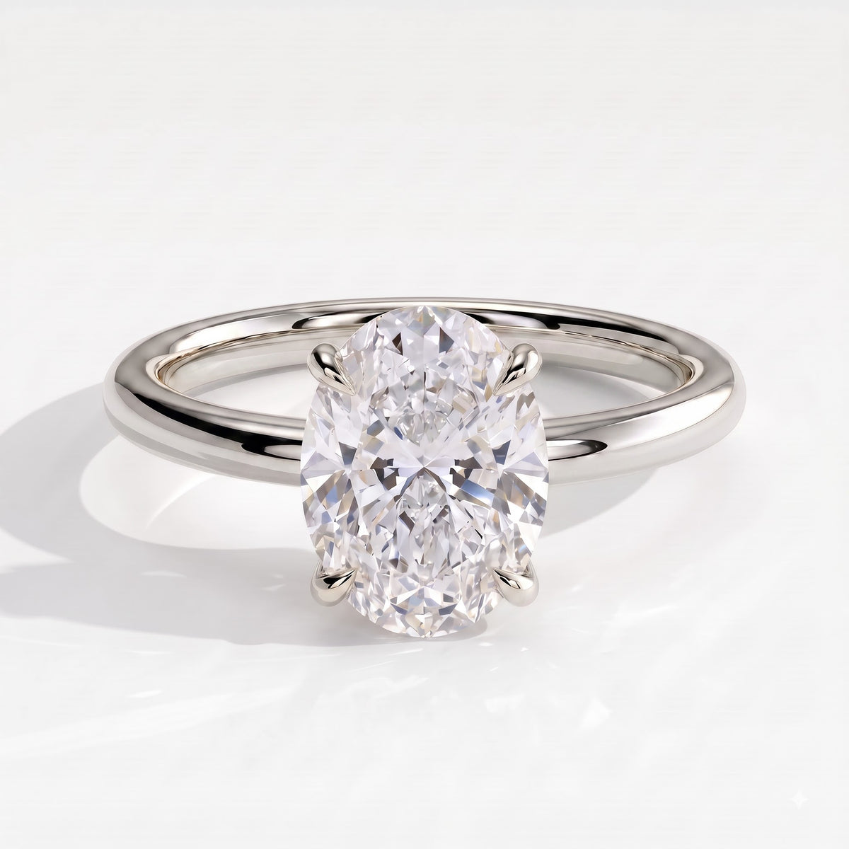 Oval lab-grown diamond solitaire engagement ring in 950 platinum, front view 