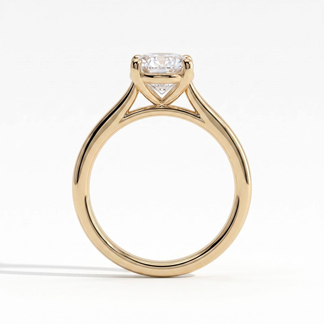 Oval lab-grown diamond solitaire engagement ring in 14K (585) yellow gold, side profile 
