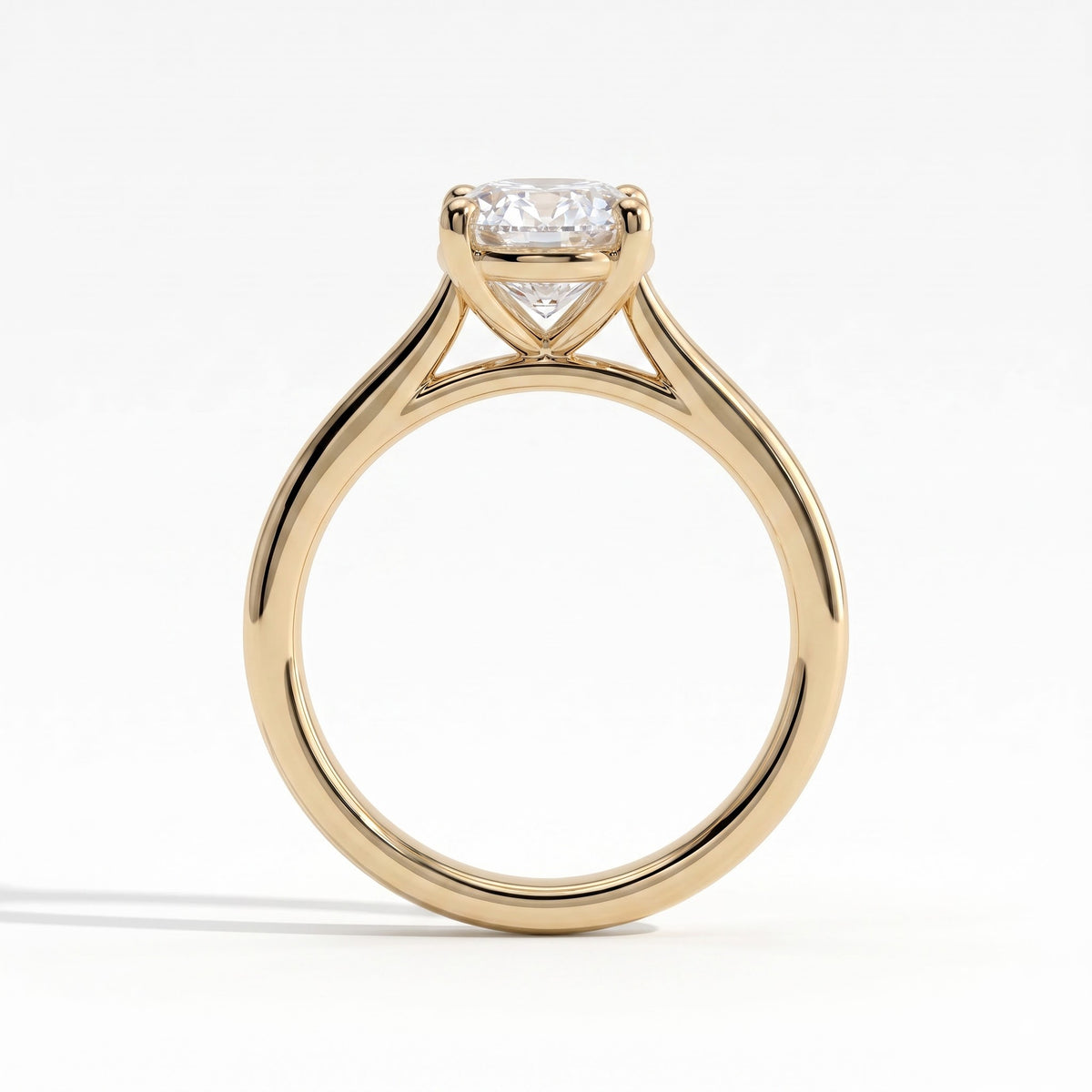 Oval lab-grown diamond solitaire engagement ring in 14K (585) yellow gold, side profile 