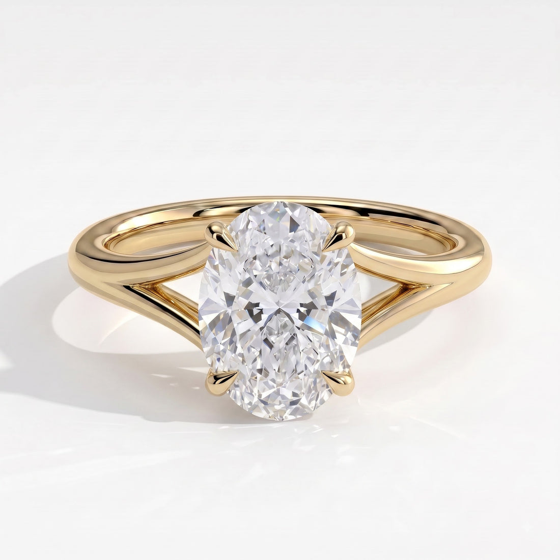 Oval lab-grown diamond solitaire engagement ring in 14K (585) yellow gold, front view 