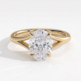 Oval lab-grown diamond solitaire engagement ring in 14K (585) yellow gold, front view 