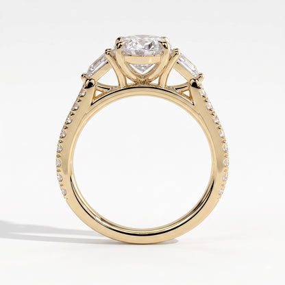 Oval lab-grown diamond three-stone engagement ring in 14K (585) yellow gold, side profile 