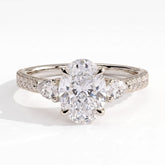 Oval lab-grown diamond three-stone engagement ring in 14K (585) white gold, front view 