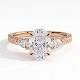 Oval lab-grown diamond three-stone engagement ring in 14K (585) rose gold, front view 