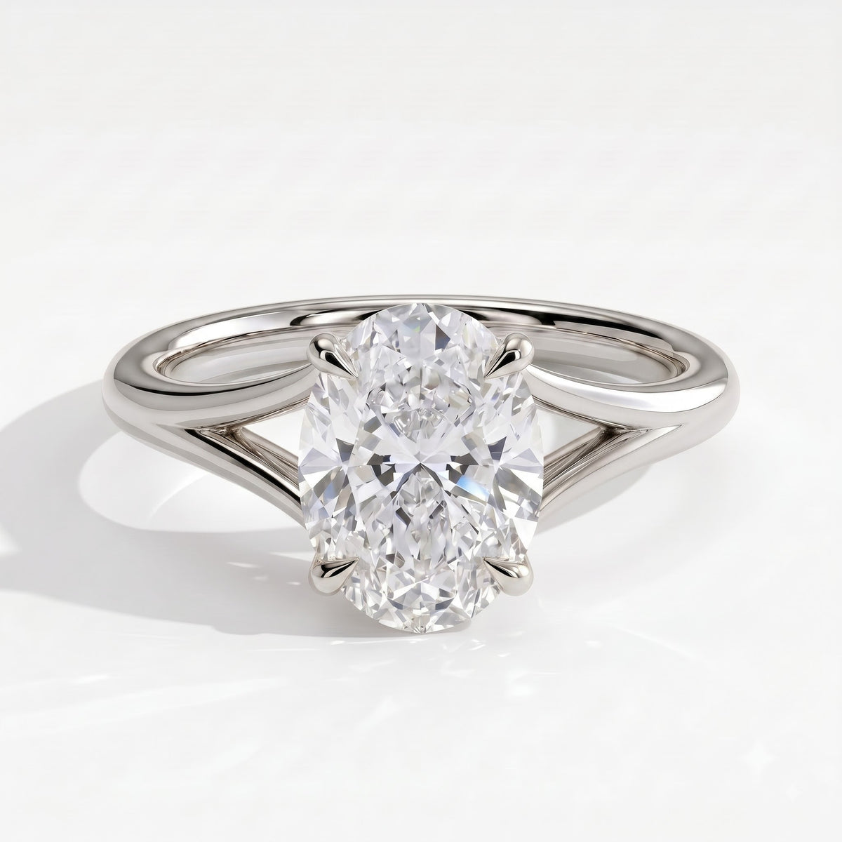 Oval lab-grown diamond solitaire engagement ring in 18K (750) white gold, front view 
