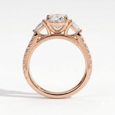 Oval lab-grown diamond three-stone engagement ring in 18K (750) rose gold, side profile 