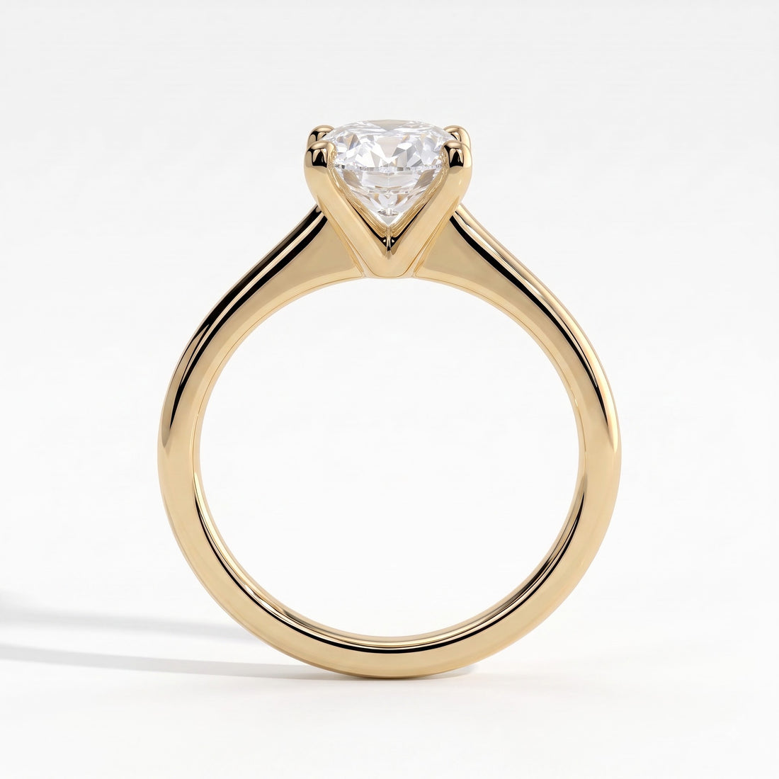 Oval lab-grown diamond solitaire engagement ring in 14K (585) yellow gold, side profile 