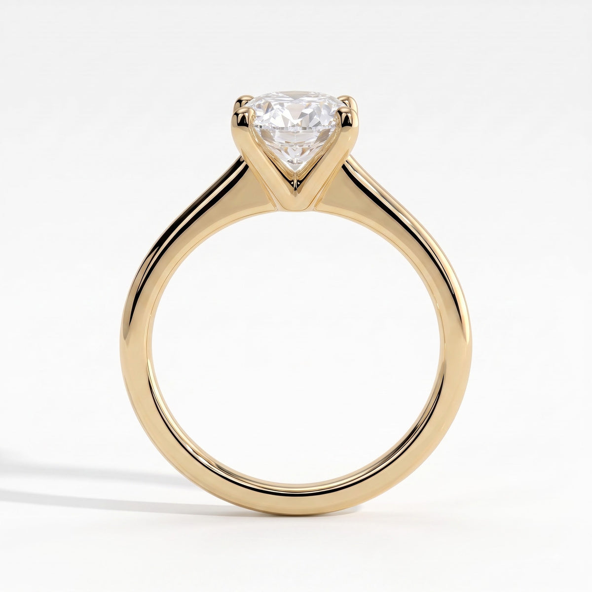 Oval lab-grown diamond solitaire engagement ring in 14K (585) yellow gold, side profile 