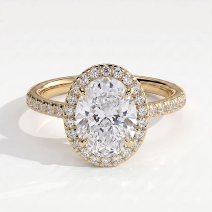 Oval lab-grown diamond halo engagement ring in 18K (750) yellow gold, front view 