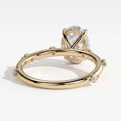 Oval lab-grown diamond halo engagement ring in 14K (585) yellow gold, on white background 