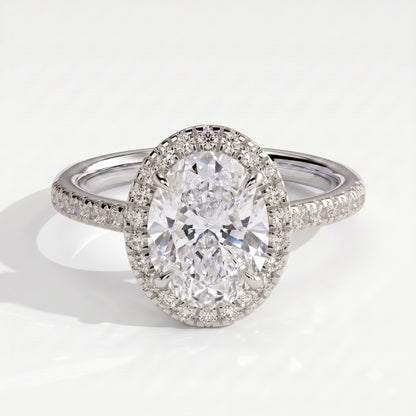 Oval lab-grown diamond halo engagement ring in 950 platinum, front view 