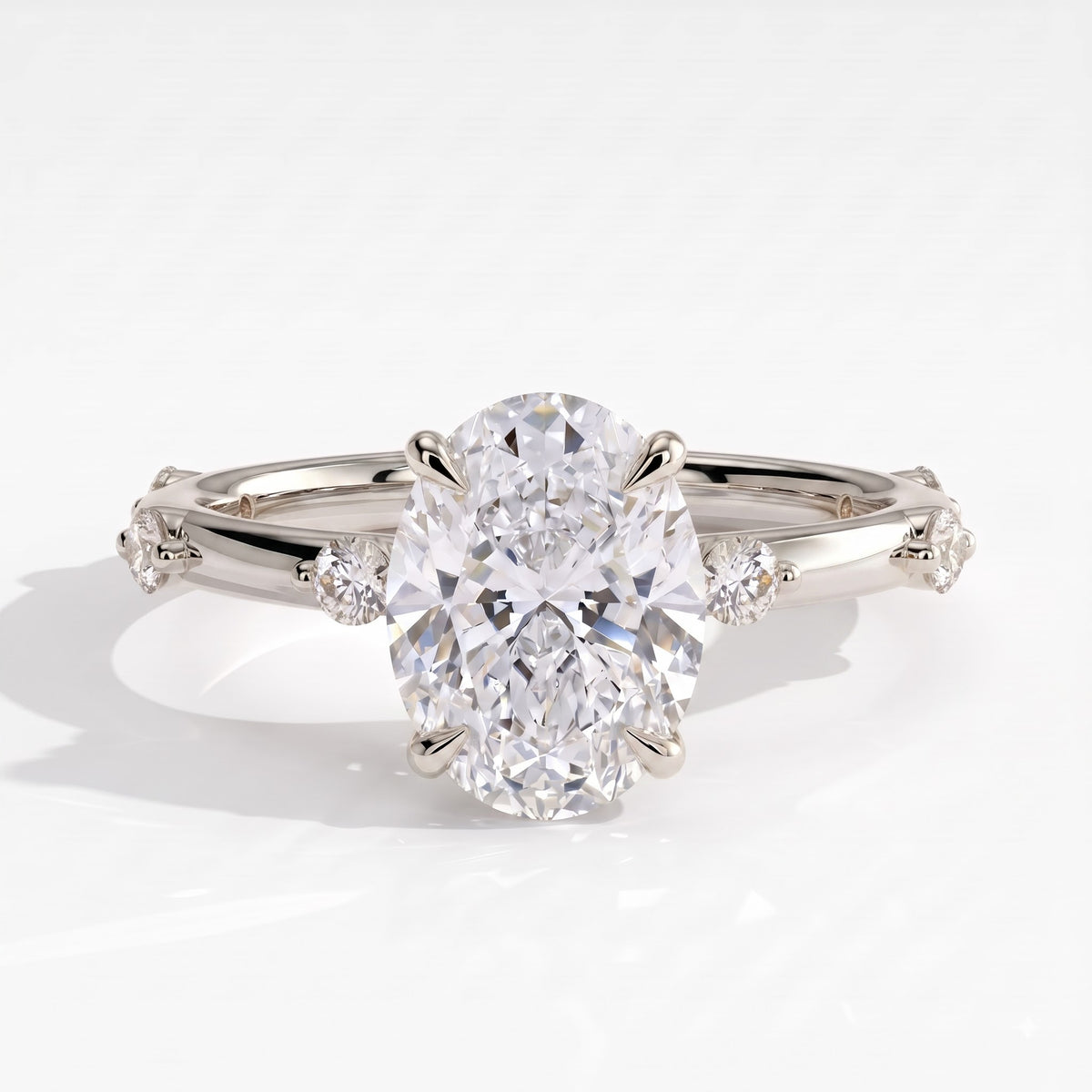 Oval lab-grown diamond halo engagement ring in 18K (750) white gold, front view 