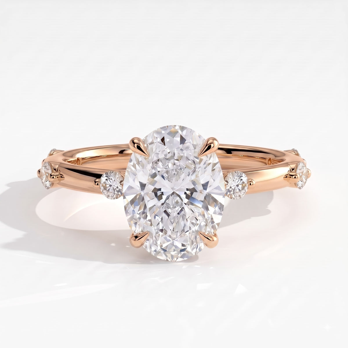 Oval lab-grown diamond halo engagement ring in 18K (750) rose gold, front view 