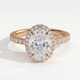Oval lab-grown diamond halo engagement ring in 18K (750) rose gold, front view 