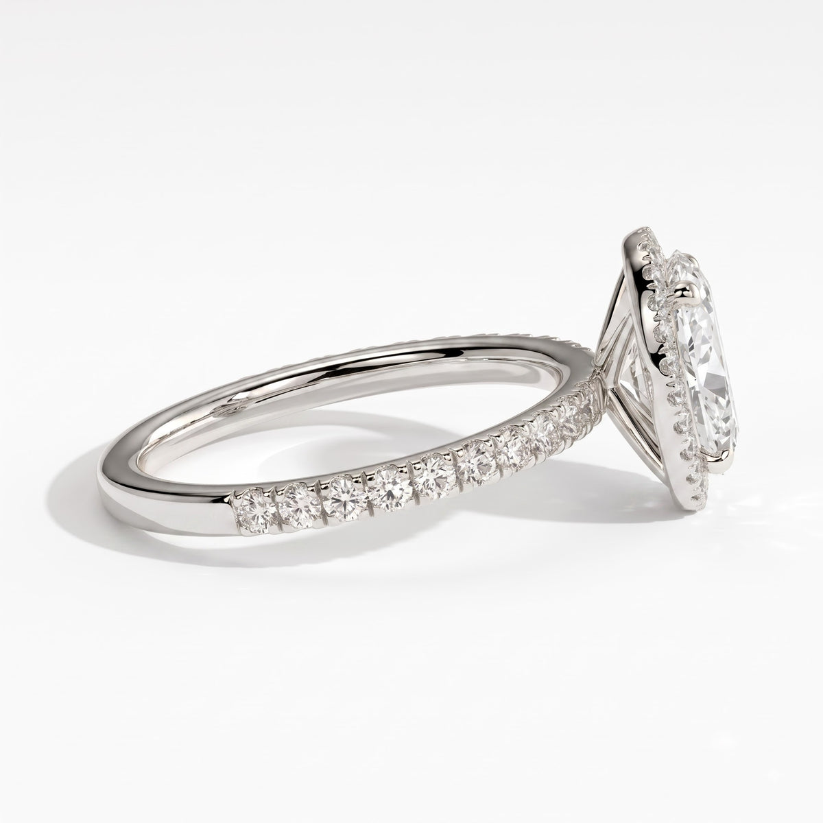 Oval lab-grown diamond halo engagement ring in 950 platinum, detail view 