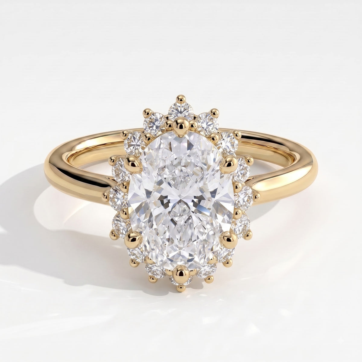 Oval lab-grown diamond halo engagement ring in 14K (585) yellow gold, front view 