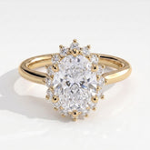 Oval lab-grown diamond halo engagement ring in 14K (585) yellow gold, front view 