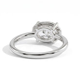 Oval lab-grown diamond bezel-set east-west solitaire engagement ring in 14K (585) white gold, on white background 