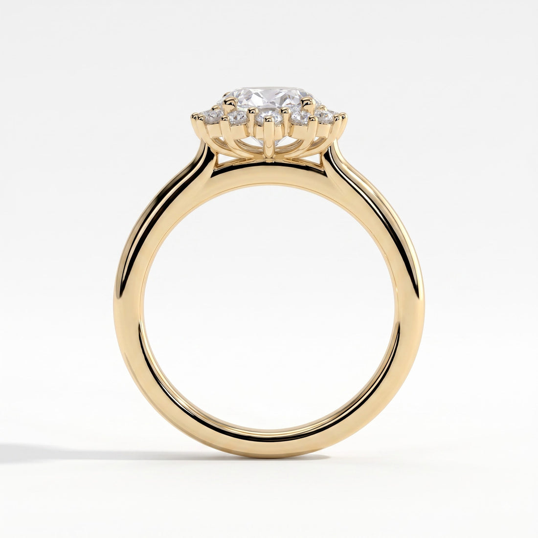 Oval lab-grown diamond halo engagement ring in 14K (585) yellow gold, side profile 