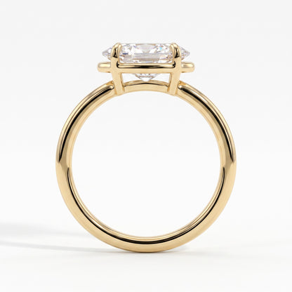 Oval lab-grown diamond bezel-set east-west solitaire engagement ring in 18K (750) yellow gold, side profile 