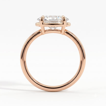 Oval lab-grown diamond bezel-set east-west solitaire engagement ring in 18K (750) rose gold, side profile 