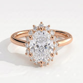 Oval lab-grown diamond halo engagement ring in 18K (750) rose gold, front view 