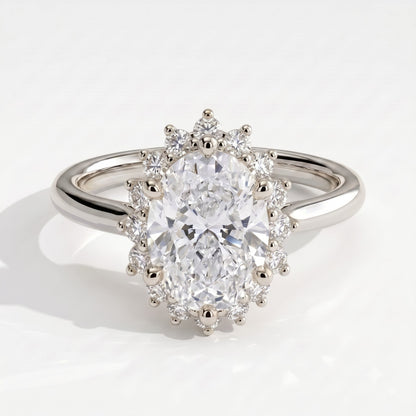 Oval lab-grown diamond halo engagement ring in 18K (750) white gold, front view 