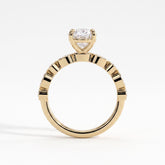 Oval lab-grown diamond bezel-set halo engagement ring in 18K (750) yellow gold, side profile 
