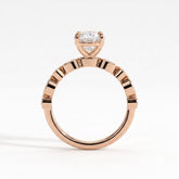 Oval lab-grown diamond bezel-set halo engagement ring in 18K (750) rose gold, side profile 