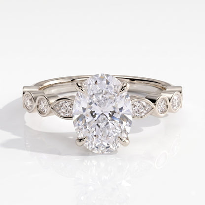 Oval lab-grown diamond bezel-set halo engagement ring in 950 platinum, front view 