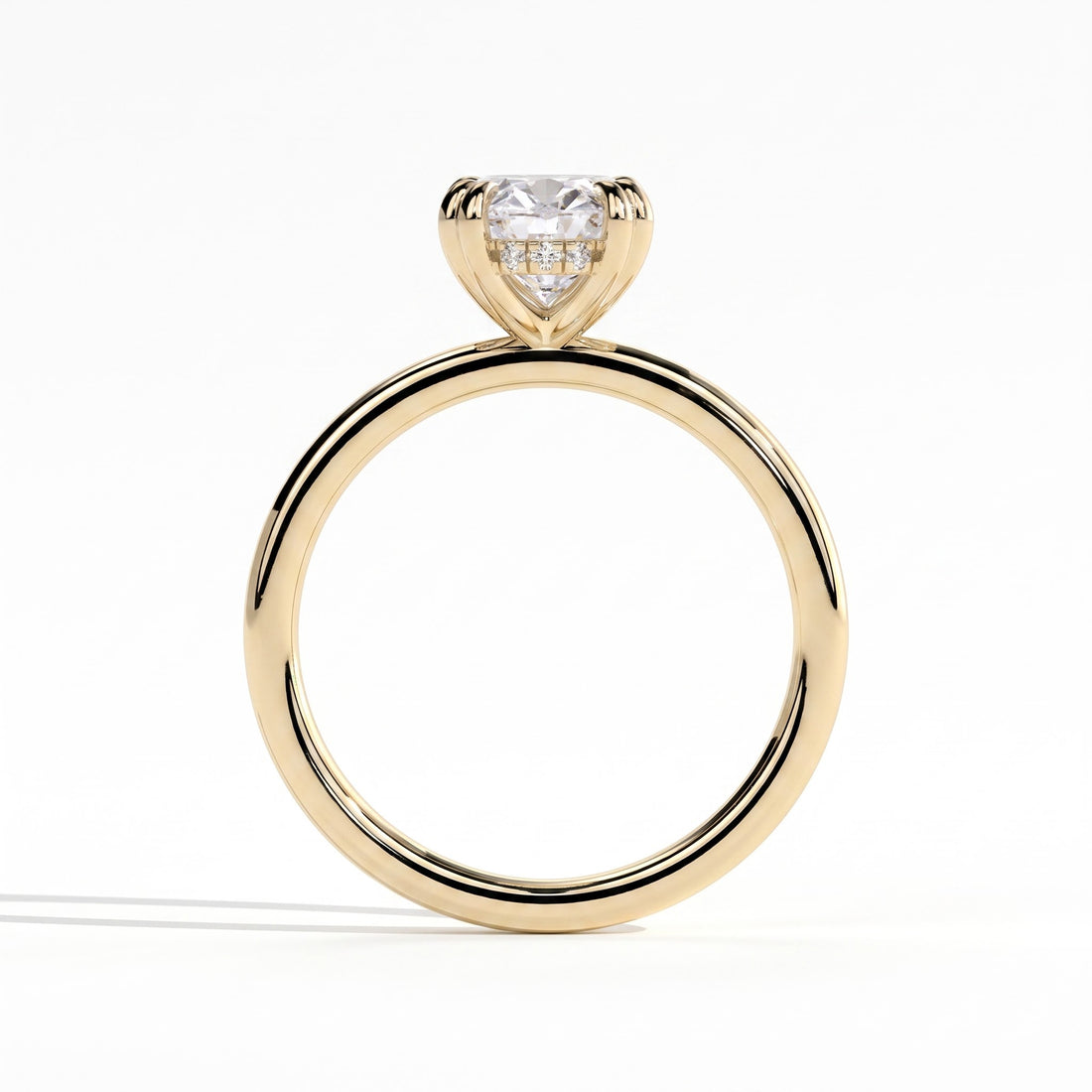 Oval lab-grown diamond halo engagement ring in 14K (585) yellow gold, side profile 
