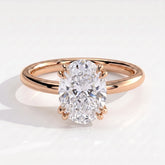 Oval lab-grown diamond halo engagement ring in 14K (585) rose gold, front view 