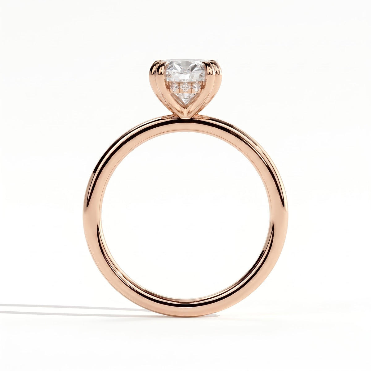 Oval lab-grown diamond halo engagement ring in 14K (585) rose gold, side profile 