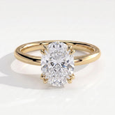 Oval lab-grown diamond halo engagement ring in 18K (750) yellow gold, front view 