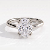 Oval lab-grown diamond halo engagement ring in 18K (750) white gold, front view 
