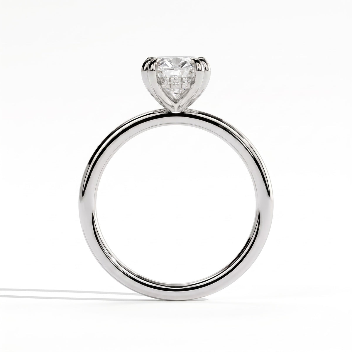 Oval lab-grown diamond halo engagement ring in 950 platinum, side profile 