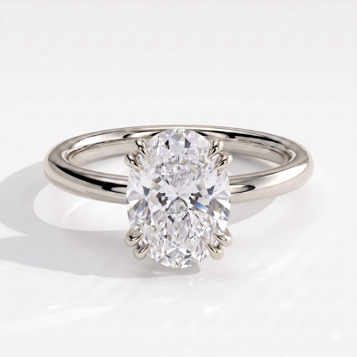 Oval lab-grown diamond halo engagement ring in 950 platinum, front view 