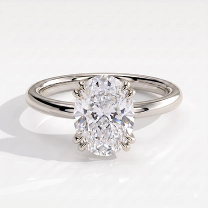 Oval lab-grown diamond halo engagement ring in 950 platinum, front view 