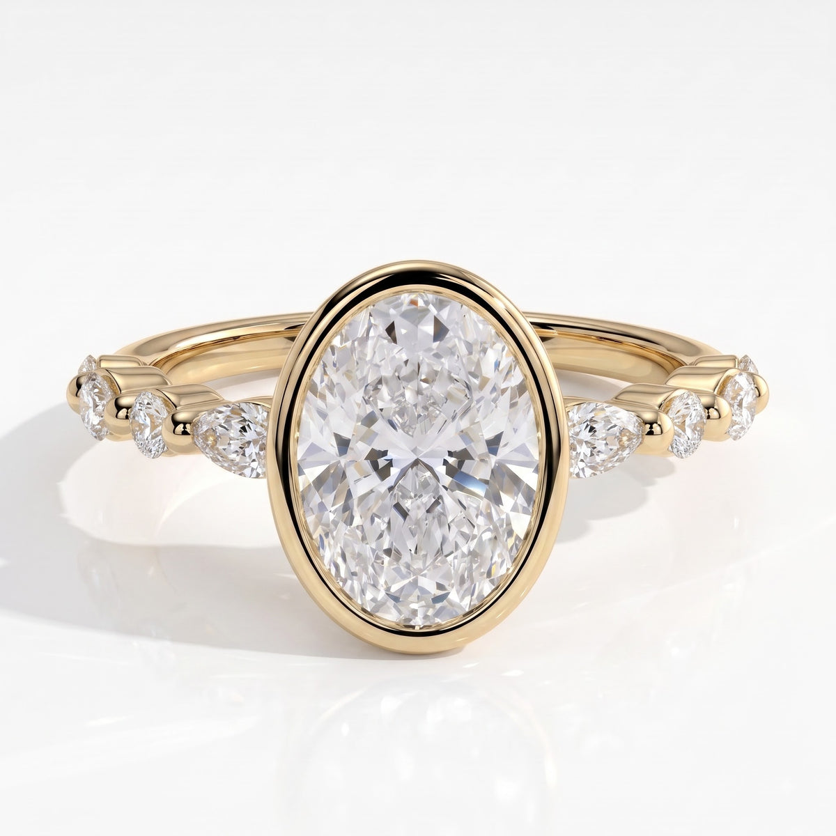 Oval lab-grown diamond bezel-set halo engagement ring in 14K (585) yellow gold, front view 