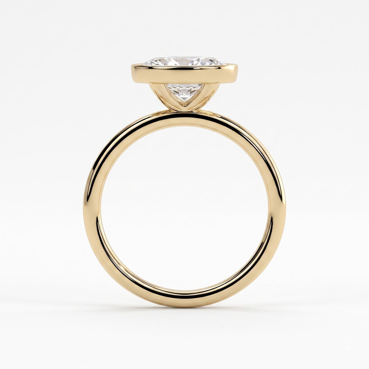 Oval lab-grown diamond bezel-set east-west solitaire engagement ring in 14K (585) yellow gold, side profile 