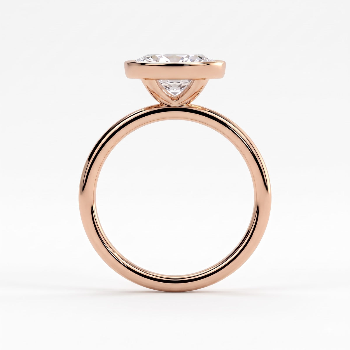 Oval lab-grown diamond bezel-set east-west solitaire engagement ring in 14K (585) rose gold, side profile 