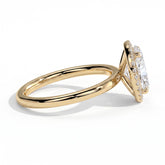 Oval lab-grown diamond halo engagement ring in 18K (750) yellow gold, detail view 